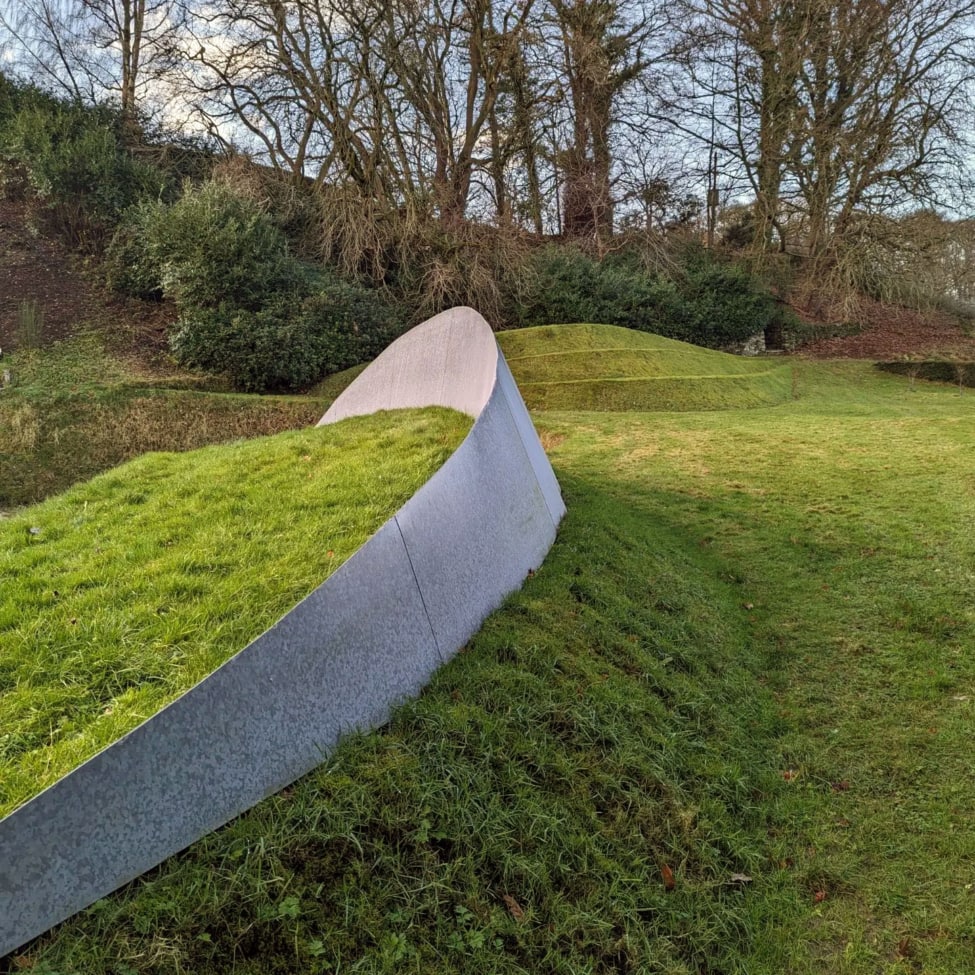 a concrete lip at the garden of cosmic speculation